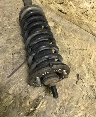 Nissan Navara D40 Front shock absorber with coil spring
