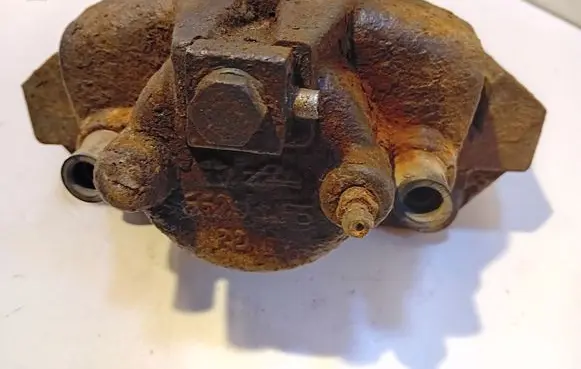 Chrysler Grand Voyager IV Front brake caliper