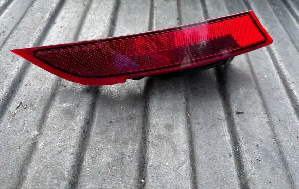 Rear tail light reflector