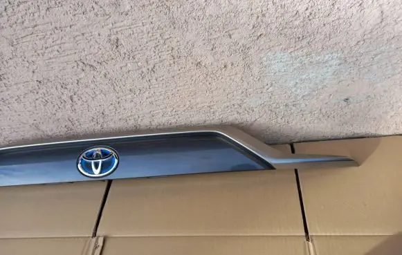 Toyota RAV 4 (XA50) Trunk door license plate light bar 7680142240 7681142390 7680142260