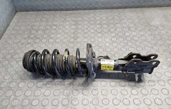 Buick Encore I Front shock absorber with coil spring 95266856 7B141
