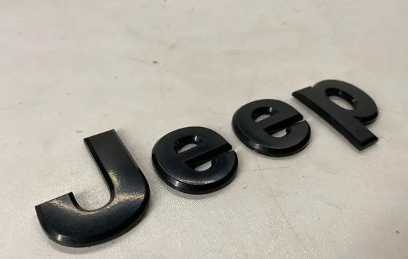 Jeep Grand Cherokee Manufacturer badge logo/emblem 68193400AA