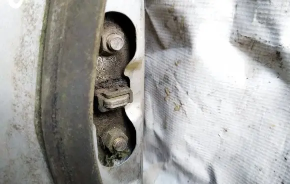 Mazda 626 Front door check strap stopper 