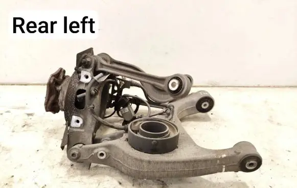 Rear wheel hub spindle/knuckle