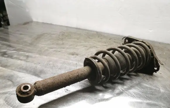 Nissan Primera Rear shock absorber with coil spring 