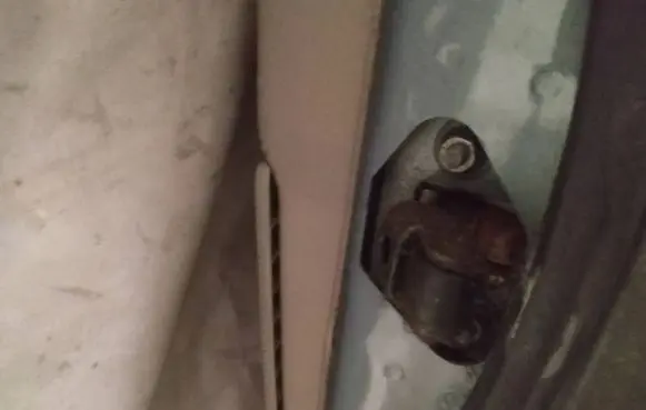 Volvo S60 Rear door check strap stopper