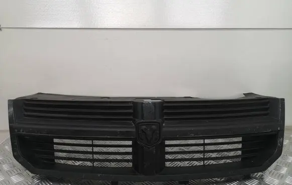 Dodge Avenger Front bumper upper radiator grill 05116322