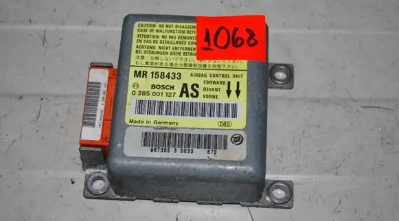 Mitsubishi Carisma Airbag control unit/module 0285001127