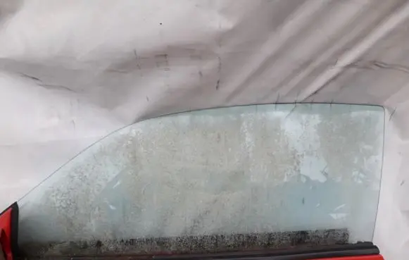 Mazda MX-6 Front door window glass four-door