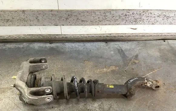 Cadillac SRX Front shock absorber with coil spring 25700258