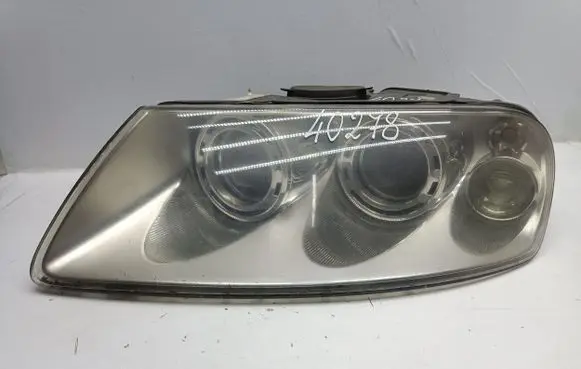 Volkswagen Touareg I Headlight/headlamp 7L6941015B