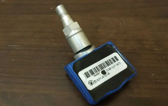 Nissan Juke I F15 Tire pressure sensor 407001AA0B