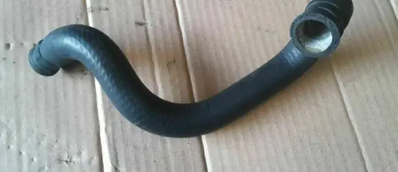 Volkswagen Golf II Engine coolant pipe/hose 027121096A