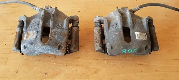 Peugeot 208 I Front brake caliper KJAERT56789