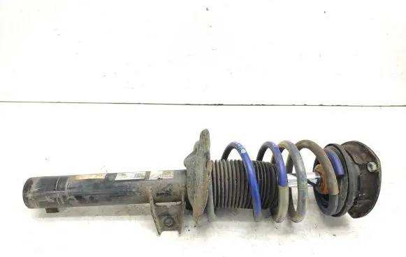 Volkswagen Golf VII Front shock absorber with coil spring 5Q0412037JL 5Q0413031FN