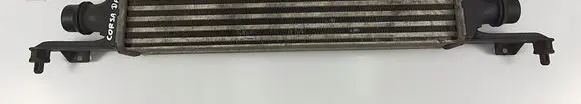 Opel Corsa D Intercooler radiator 872051000
