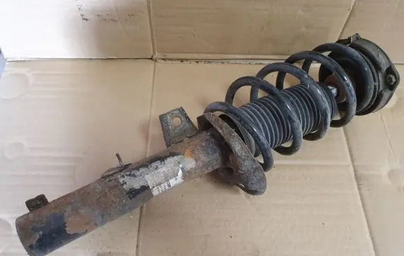 Volkswagen PASSAT CC Front shock absorber with coil spring 3C0413031D