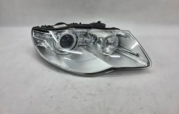 Volkswagen Touareg I Headlight/headlamp 7L6941040C