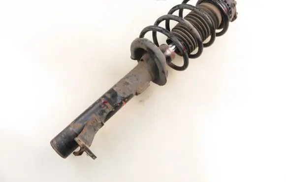 Front shock absorber with coil spring