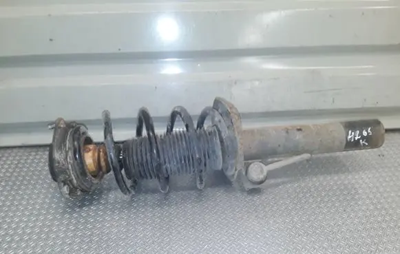 Volkswagen Golf VI Front shock absorber with coil spring 