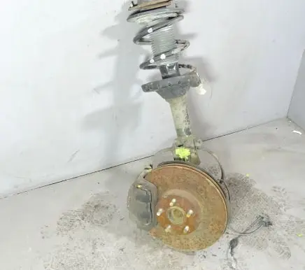 Subaru Legacy Front shock absorber with coil spring