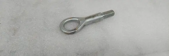 Towing hook eye