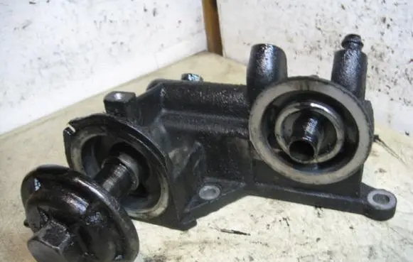 Renault Espace III Oil filter mounting bracket 7700858576