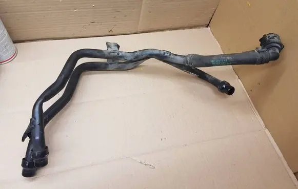 Volkswagen Golf VII Engine coolant pipe/hose 5Q1815097J 5Q0815369C