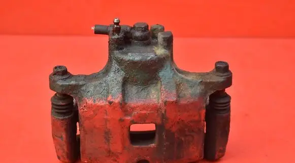 Mitsubishi Lancer VIII Front brake caliper