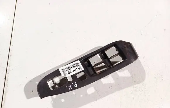 Subaru Legacy Front door window switch trim 94266ae010