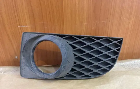 Mazda Premacy Front bumper lower grill C14650C21
