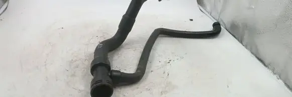 Volkswagen PASSAT B5 Engine coolant pipe/hose 8d01210556