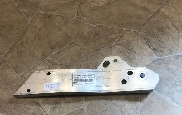 Radiator support slam panel bracket