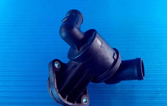 Thermostat/thermostat housing