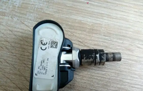 Opel Astra J Tire pressure sensor 13598775 NE59719