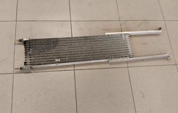 Chrysler Voyager Engine oil radiator 04809272AD