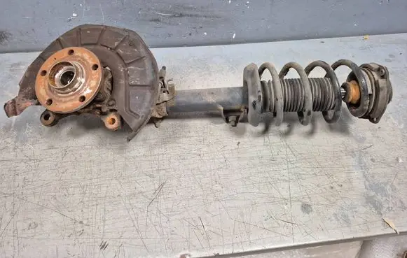 Volkswagen Golf Plus Front shock absorber with coil spring 