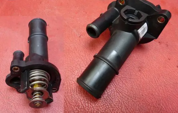 Thermostat/thermostat housing