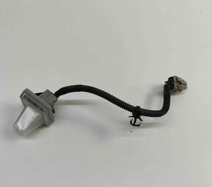Nissan Leaf I (ZE0) Number plate light 26510CD00A