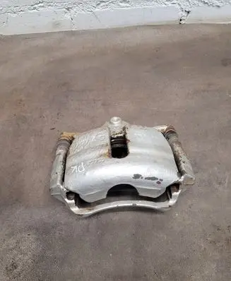 Volkswagen Golf VII Front brake caliper