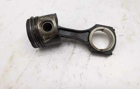 Piston with connecting rod