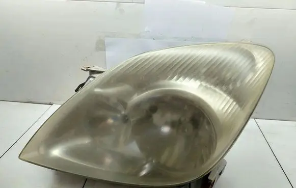 Toyota Corolla Verso E121 Headlight/headlamp 9922679004