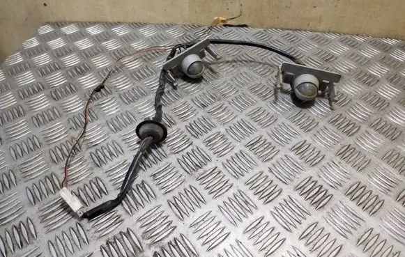 Mazda 323 F Number plate light 13061365