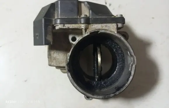 Volkswagen Caddy Throttle valve 03G128063G