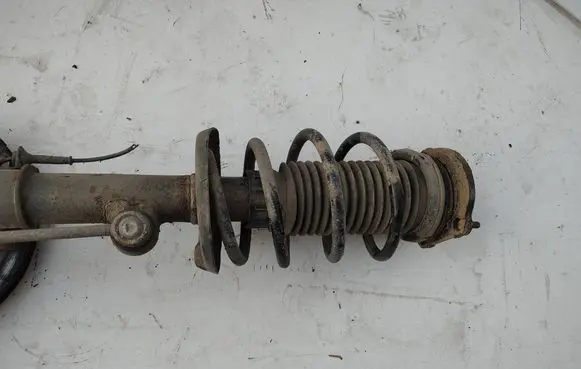 Opel Combo D Front shock absorber with coil spring 