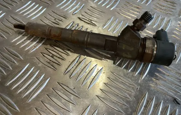 Opel Astra J Fuel injector 0445110327