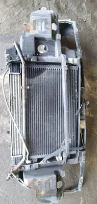 Radiator support slam panel