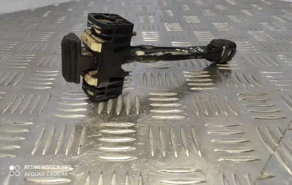 Opel Zafira B Front door check strap stopper 13227947
