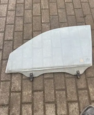 Hyundai Tucson JM Front door window glass four-door