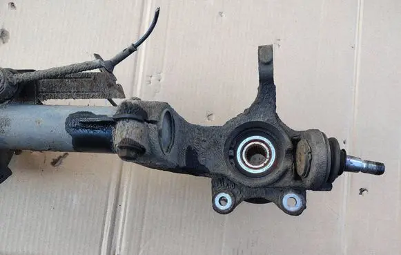 Front wheel hub spindle knuckle